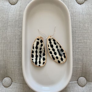 The Addy on The Sakonnet Drop - Low Tides Design Oyster Shell Lid Earrings in Cream & Black dot Print w/Gold Edge