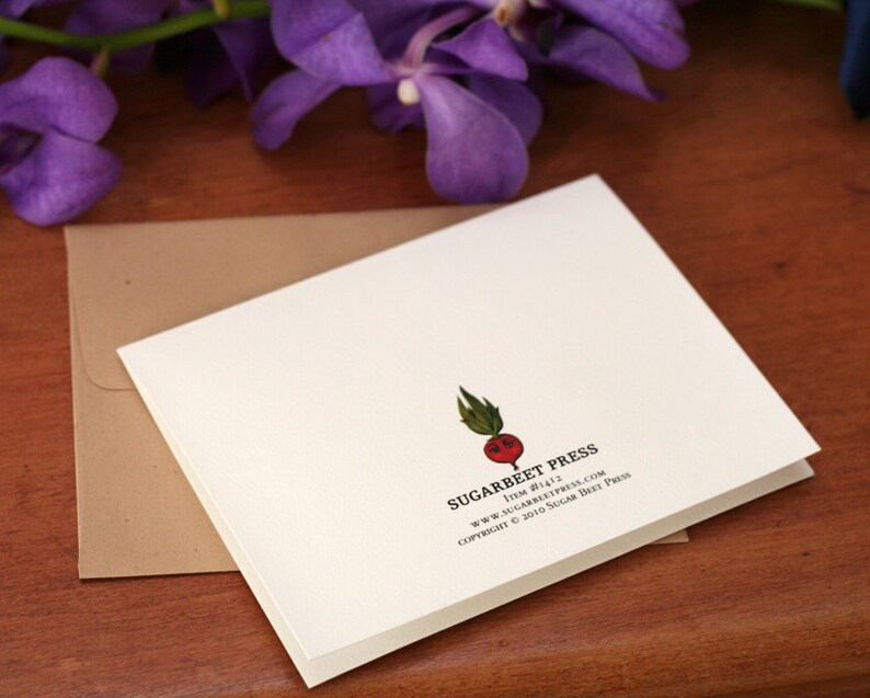 May include: A white card with a red and green illustration of a beet with the text "Sugarbeet Press" and the website address "www.sugarbeetpress.com". The copyright information reads "Copyright &copy; 2010 Sugar Beet Press".