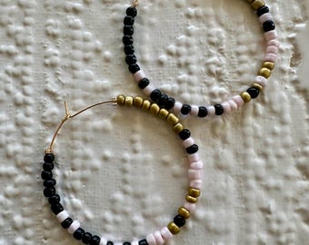 Light pink, gold and black beaded hoop earrings