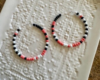 Coral, white and black beaded hoop earrings