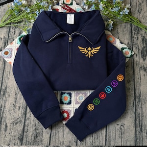 The Legend of Zelda: Triforce Hylian Crest Embroidered Sweatshirt And Hoodie, Tears of the Kingdom Embroidered Quarter Zip, Gift For Gamer
