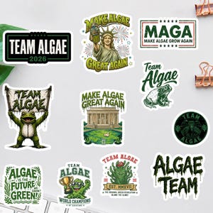 May include: A collection of eleven vinyl stickers featuring various green-themed designs with text including Team Algae 2026, Make Algae Great Again, Team Algae, Algae Is The Future, and Algae Team, showcasing frogs, the Statue of Liberty, and monuments.