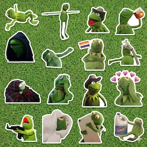 May include: A selection of Kermit the Frog stickers in different poses and attire, such as a cowboy hat, holding a rainbow flag, and with hearts above his head. The stickers are set against a green, grassy backdrop.