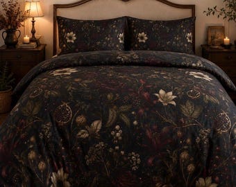 May include: A dark-colored duvet cover and two matching pillowcases featuring a botanical print of white flowers, dark red berries, and green foliage. The bedding set is displayed on a bed with a wooden headboard, creating a cohesive look.