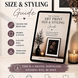以下が含まれることがあります： タブレット画面に表示された「The Ultimate Art Print Size & Styling Guide」というタイトルのデジタルガイド。このガイドには、サイズ、フレーム、ギャラリーウォールのレイアウト、およびデジタルダウンロード用のテンプレートを選択するためのセクションが含まれています。