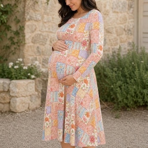 May include: A long-sleeved midi dress featuring a patchwork pattern of various floral prints in soft pastel shades of pink, yellow, blue, and orange. The dress has a round neckline and a fitted bodice that flows into a flared skirt silhouette.
