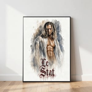 May include: A framed wall art print featuring a watercolor-style illustration of a person with long blonde hair, wearing an open white shirt, and a cross necklace. The text Le Stat is written in a dark red, gothic-style font at the bottom.