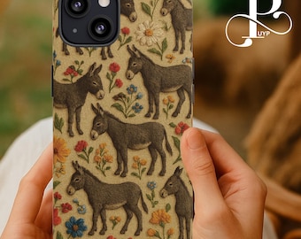 Könnte beinhalten: Eine Handyhülle mit einem floralen Muster mit braunen und weißen Eseln. Die Hülle hat einen braunen Hintergrund mit weißen Blumen und grünen Blättern. Die Esel sind in verschiedenen Posen, einige stehen, einige gehen und einige schauen in die Kamera.