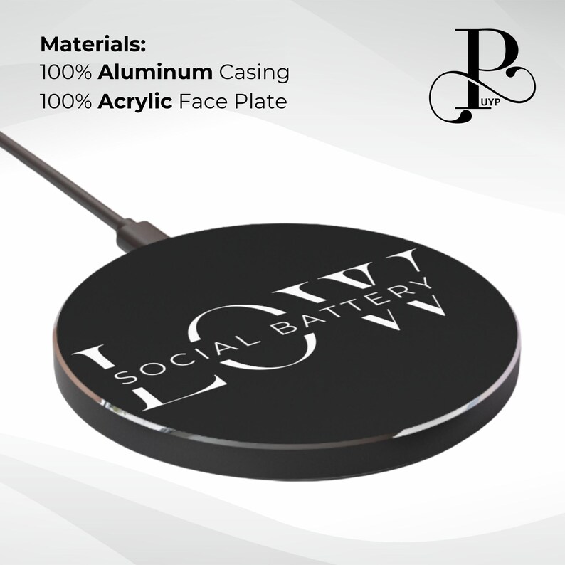 May include: A black wireless charging pad with a white logo that says "SOCIAL BATTERY" in a circular design. The charging pad is made of aluminum and acrylic.