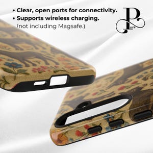 May include: A phone case with a floral pattern and a black border. The case has cutouts for the camera and charging port. The text on the case reads "Clear, open ports for connectivity. Supports wireless charging. (not including Magsafe.)"