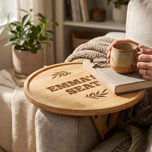 May include: A set of three ceramic mugs with a speckled, matte finish. The mugs are in shades of cream, light gray, and dark gray. Each mug has a simple, minimalist design and a rounded handle.