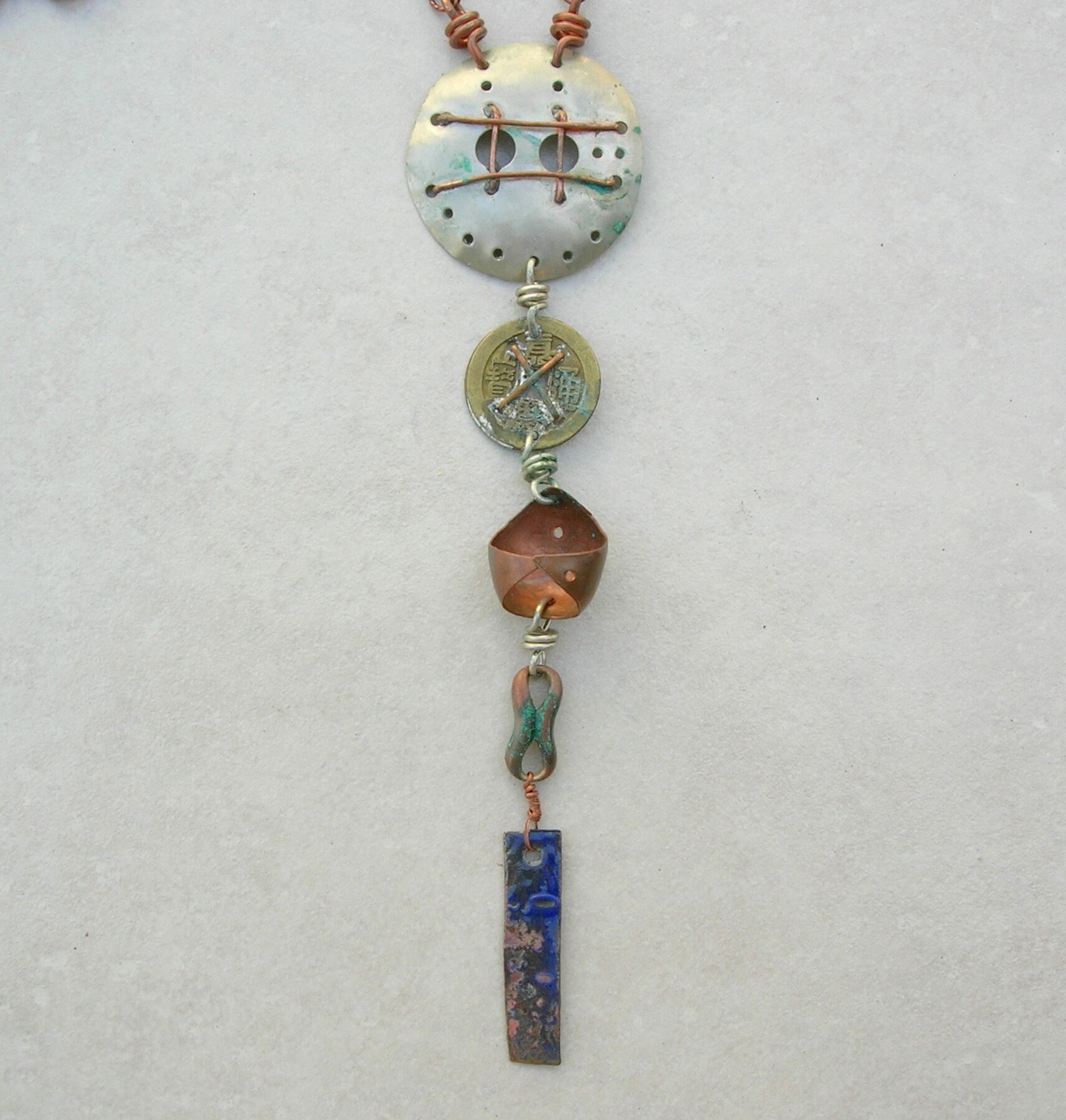 Long Industrial Cascade, Hand-forged, Copper-caged Silver Pendant