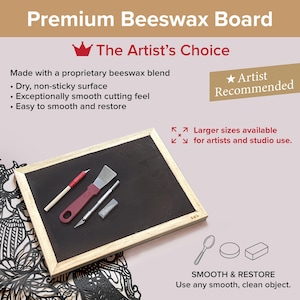 May include: A rectangular black beeswax board with a light wood frame. The board is displayed with a red-handled scraper, a silver craft knife, and a small blade. Text on the board reads Premium Beeswax Board, The Artist's Choice, and Artist Recommended.