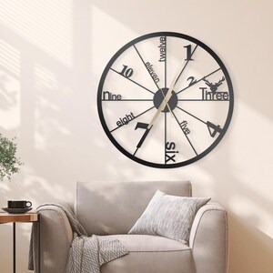 Modern Metal Wall Clock with Abstract Design & Large Numerals Unique, Stylish, Perfect for Home/Office Decor. Ideal Gift for Any Occasion
