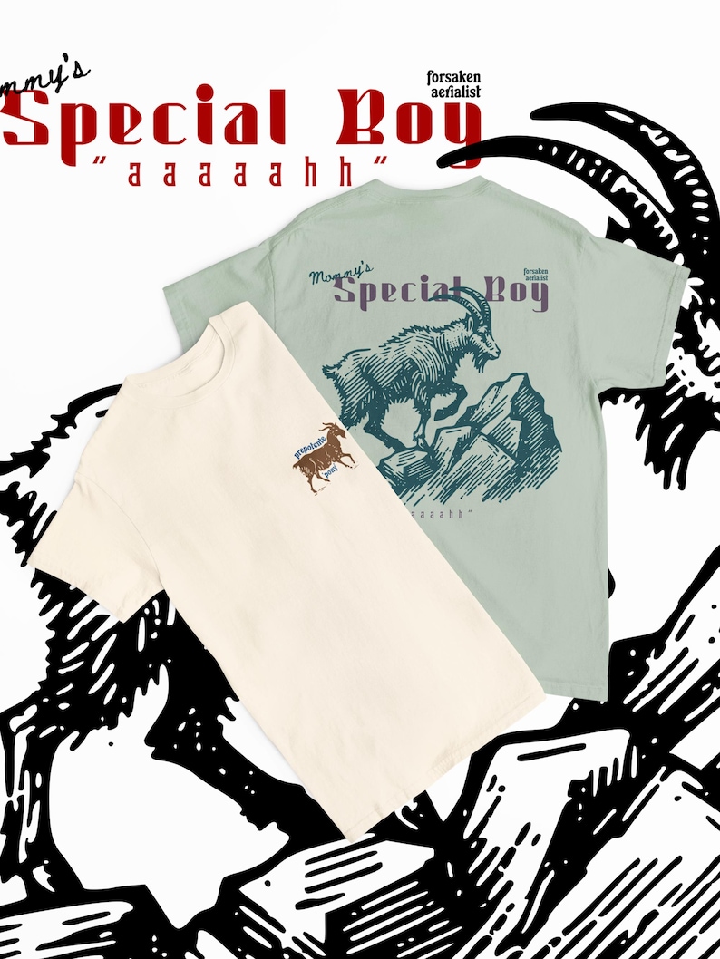 May include: Two t-shirts with graphic designs. One is cream-colored with a small goat illustration, the other is light green with a goat on a mountain illustration. Text on the shirts reads "Mommy's Special Boy" and "aaaaahhh".