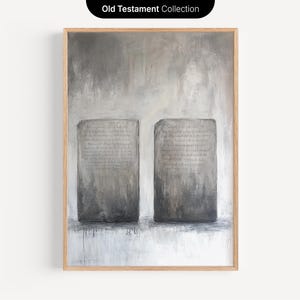 May include: A painting of two gray stone tablets with text on them, set against a gray and white background. The painting is framed in a light wood frame. The title "Old Testament Collection" is written at the top of the image.