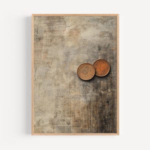 May include: Two copper-colored coins on a textured, gray and brown background. The coins are slightly worn and have a raised design.