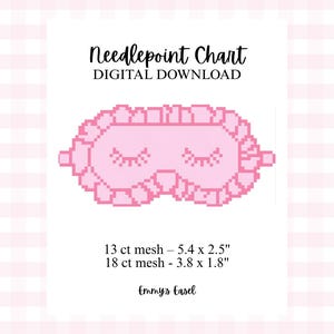 May include: A pink digital download needlepoint chart featuring a pixelated sleep mask design. The mask has closed eyes and a ruffled edge. The chart includes mesh sizes and dimensions: 5.4 x 2.5 inches and 3.8 x 1.8 inches.