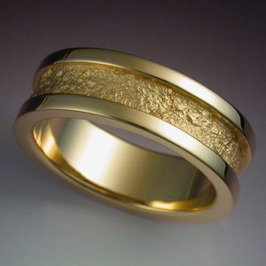 14k gold man's wedding band with rock texture