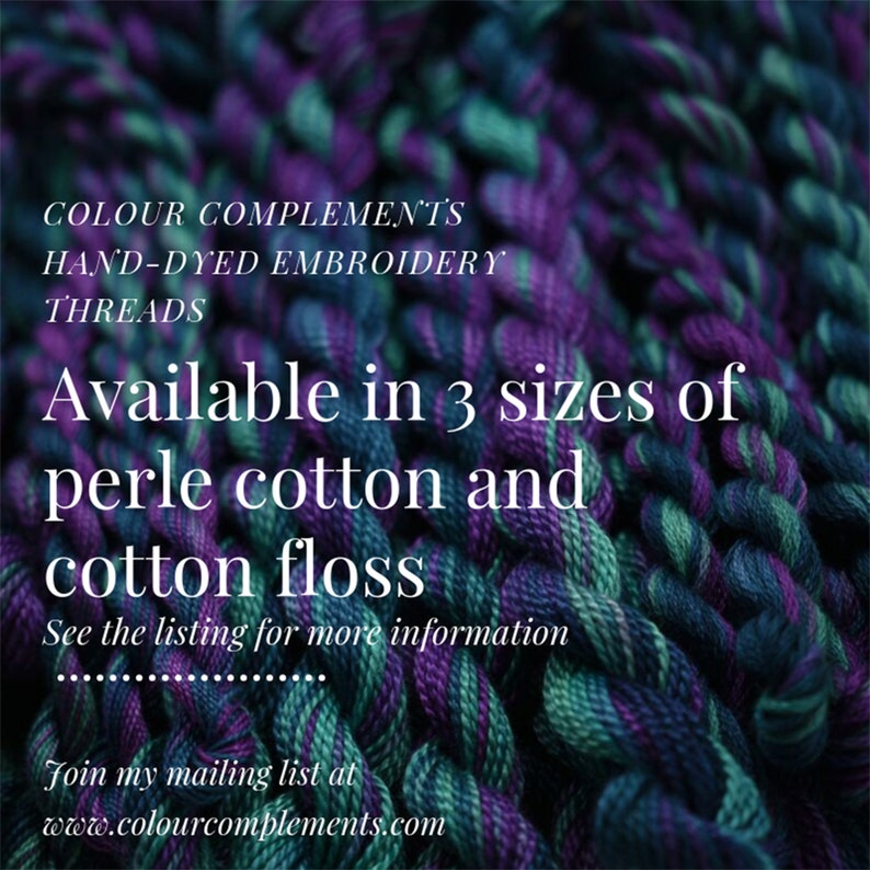 May include: Close-up of hand-dyed embroidery threads in shades of purple, teal, and green. The image includes text that reads "COLOUR COMPLEMENTS HAND-DYED EMBROIDERY THREADS" and "Available in 3 sizes of perle cotton and cotton floss."