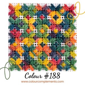 May include: A colorful cross-stitch pattern with a variety of shades of red, orange, yellow, green, blue, and purple. The pattern is stitched on white Aida cloth. The text "Colour #188" and "www.colourcomplements.com" is visible below the pattern.
