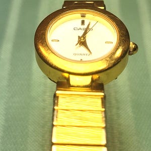 Casio LTP-2019 (1747) Gold Tone Ladies Watch - New Battery - 9mm Band Width