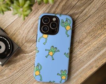 May include: A light blue phone case with a repeating pattern of green frogs with yellow bellies. The frogs are in various poses, some are jumping, some are standing, and some are waving.