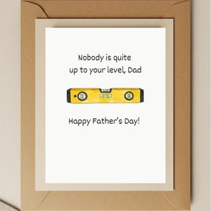 May include: A Father's Day card with a yellow level tool and the text "Nobody is quite up to your level, Dad Happy Father's Day!"