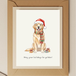 May include: A greeting card featuring a Golden Retriever wearing a Santa hat and a festive scarf. The dog is surrounded by wrapped gifts and the text "May your holidays be golden!" is printed below the dog.