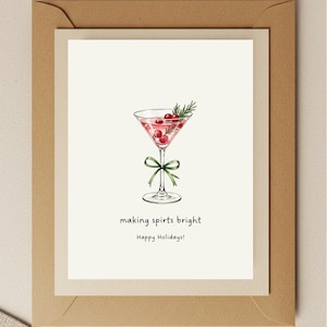 May include: Greeting card with a watercolor illustration of a cocktail in a martini glass. The drink is pink with red berries and a sprig of rosemary. A green bow adorns the stem. Text reads "making spirits bright" and "Happy Holidays!"