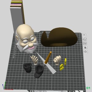 Puede incluir: Un conjunto de figuras impresas en 3D, que incluye una cabeza con barba blanca, un sombrero marrón, dos manos, un pico y una figura con el número "2". Las figuras están sobre una superficie de cuadrícula negra y blanca.