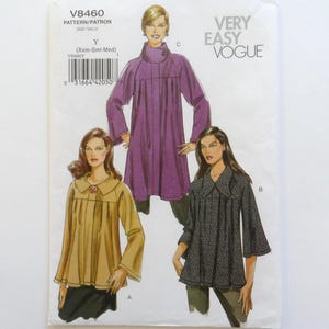 May include: A Very Easy Vogue pattern, V8460, featuring illustrations of three different women's tops. The pattern includes a purple coat, a tan top, and a gray patterned top. The size is Y (Xsm-Sml-Med).