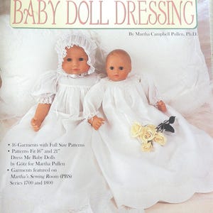 May include: A book cover titled "Martha's Baby Doll Dressing" features two baby dolls in white dresses and bonnets. The cover includes text about patterns for 16 garments, fitting 16" and 21" dolls, and mentions Martha's Sewing Room (PBS).