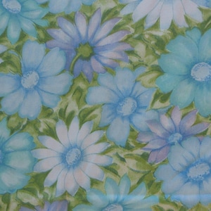 May include: A close-up of a floral pattern featuring large, stylized daisies in shades of blue and white. The flowers are set against a backdrop of green leaves, creating a vibrant and colorful design. The overall theme is a vintage floral pattern.