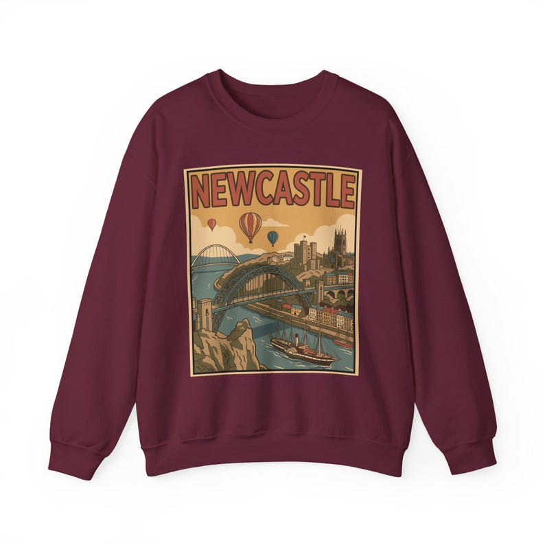 Nostalgic travel art printed on a sand sweatshirt highlighting the scenic Newcastle quayside in retro-style colors.