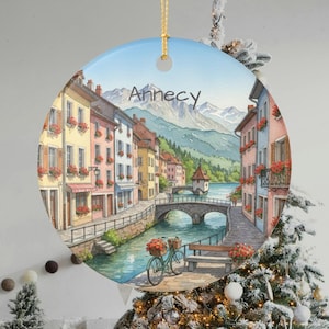 May include: A set of three ceramic mugs with a speckled, matte finish. The mugs are in shades of cream, light gray, and dark gray. Each mug has a simple, minimalist design, perfect for coffee or tea.