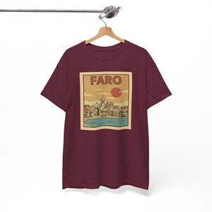Artistic detail of a nostalgic tourism graphic tee showcasing the Ria Formosa lagoons in a vintage style.