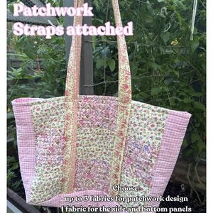 May include: A floral patchwork tote bag with attached straps. The bag features a pink and white floral pattern, with pink gingham side panels. The text "EXAMPLE BAG" and "Patchwork Straps attached" are visible.