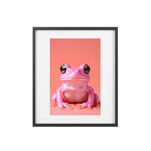 Whimsical Frog Framed Poster, Cute Wall Art for Kids Room, Fun Decor for Nature Lovers, Gift for Animal Enthusiasts, Pink Frog Artwork