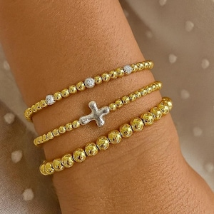 Gold Beaded Bracelet Stack: Mixed Metal Cross, Dainty Stretch Bracelets