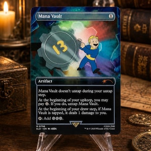 May include: A rectangular trading card titled Mana Vault featuring a cartoon character in a blue jumpsuit pushing a large grey gear with the number 13 on it. The card text describes artifact rules and includes the copyright date 2024 Wizards of the Coast.
