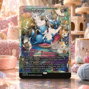 May include: A rectangular trading card titled Doubling Season featuring a holographic finish and an illustration of multiple cats in various colors. The card text describes an enchantment effect for tokens and counters, with a mana cost of 4G.