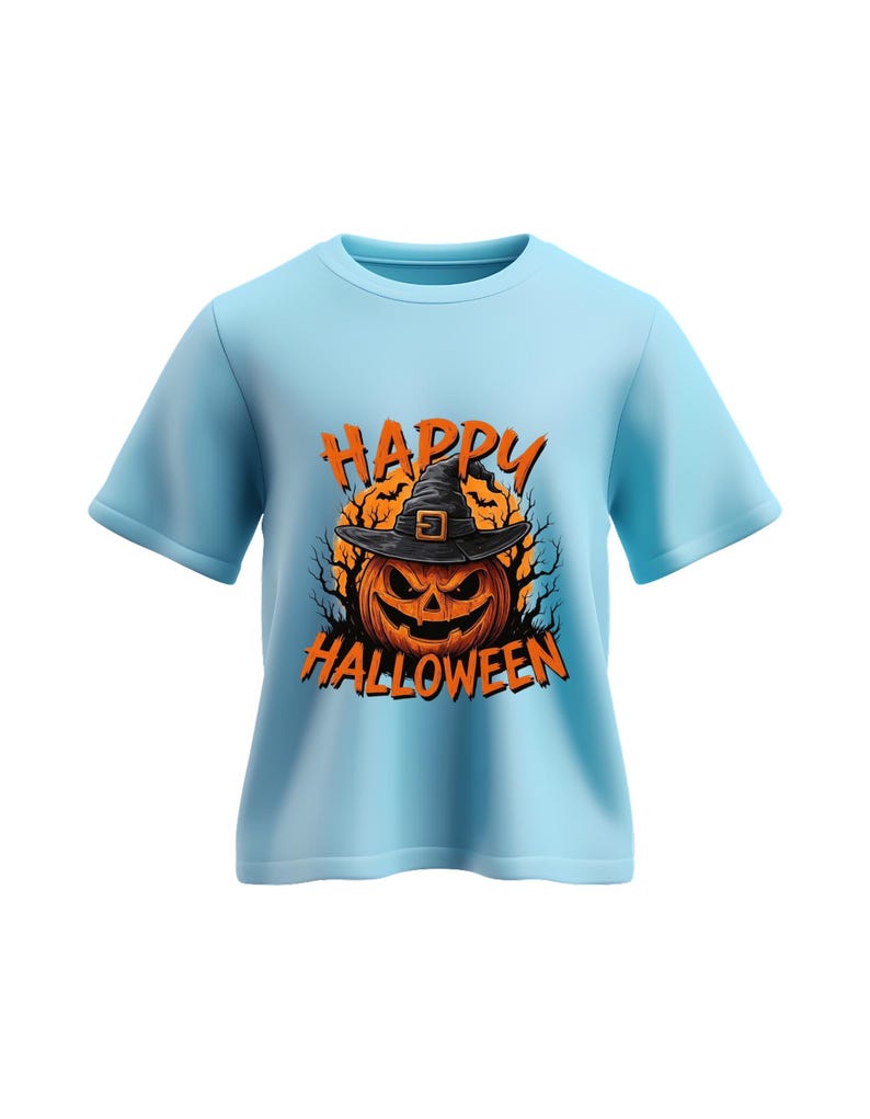 May include: A light blue t-shirt featuring a Halloween-themed graphic. The graphic includes a jack-o'-lantern wearing a witch's hat, with the words "HAPPY HALLOWEEN" in orange. The design is centered on the shirt.