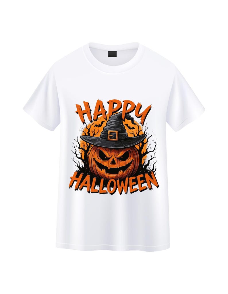 May include: White t-shirt featuring a Halloween design. The graphic includes an orange jack-o'-lantern wearing a black witch hat, with the words "HAPPY HALLOWEEN" in orange. The design is set against a dark background.