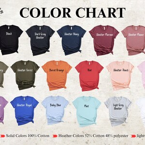 K&ouml;nnte beinhalten: Farbtabelle mit T-Shirts in verschiedenen Farbt&ouml;nen, darunter Schwarz, Marineblau und Rot. Die Tabelle zeigt die Farbbezeichnungen und die Materialzusammensetzung der Hemden, die leicht sind, 119 Gramm.