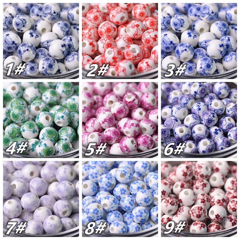 May include: Nine different styles of ceramic beads with floral patterns. The beads are white with various colored floral designs, including blue, red, green, purple, and pink.