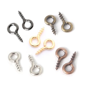 Può includere: Assortimento di ganci ad occhiello a vite in diverse finiture, tra cui argento, oro, bronzo e nero.