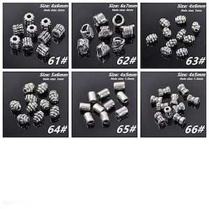 May include: Assortment of silver metal beads in various sizes and styles. The beads are arranged in rows on a black surface. The beads are labelled with their size and hole size in millimetres.  The beads are perfect for jewellery making, crafts, and other projects.