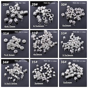 May include: Assortment of silver metal beads in various shapes and sizes. The beads are arranged in rows with their size and hole size listed below each row. The beads are perfect for jewellery making, crafts, and other DIY projects.