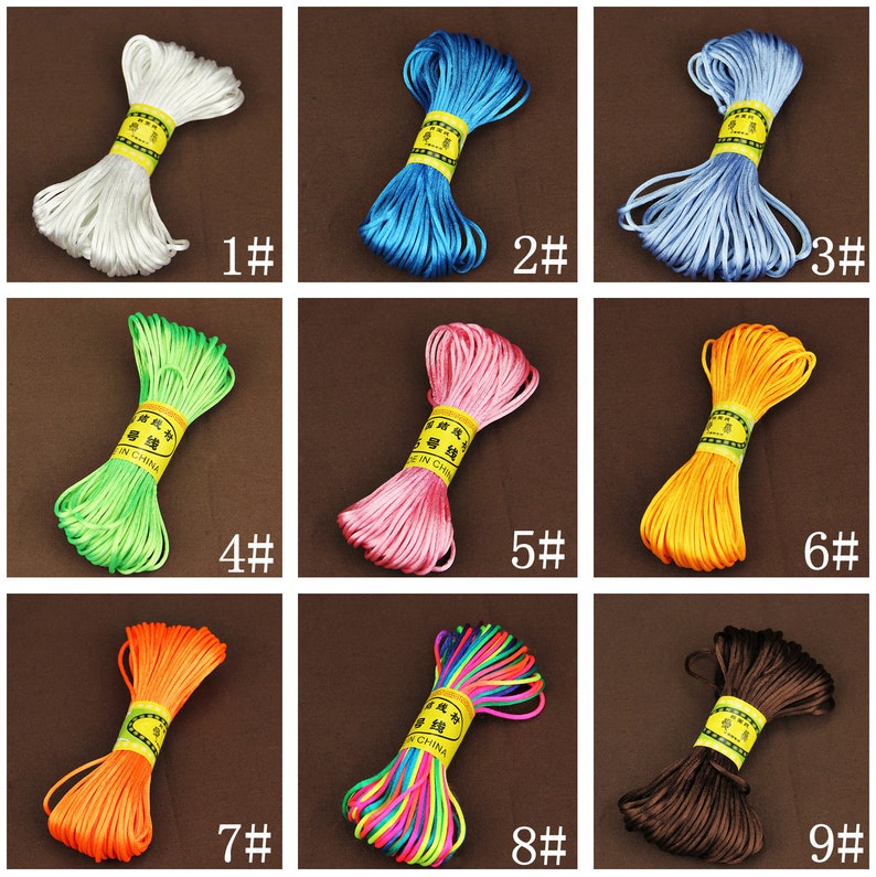 May include: Nine spools of colorful waxed cord, each wrapped in a yellow label with Chinese characters and the words "Made in China".